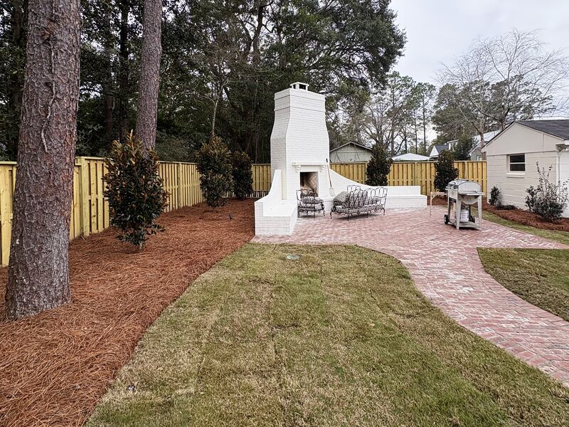 Backyard renovation with outdoor fireplace